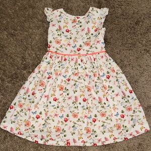 Ama Almeida Ruffle Sleeve Tie Back Dress